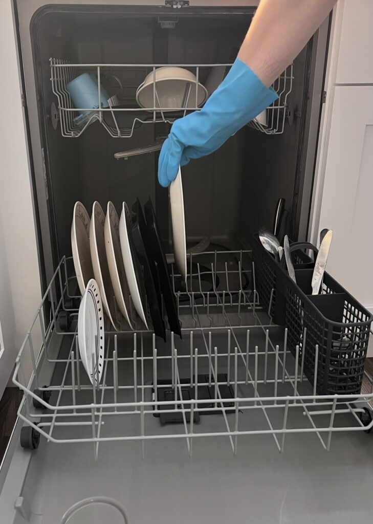 empty dishwasher as part of a morning cleaning routine