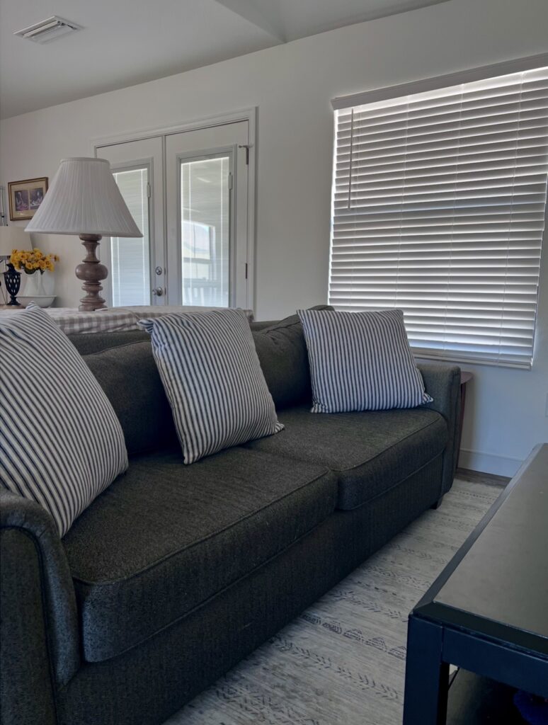 tidy living room as part of evening routine for homemakers