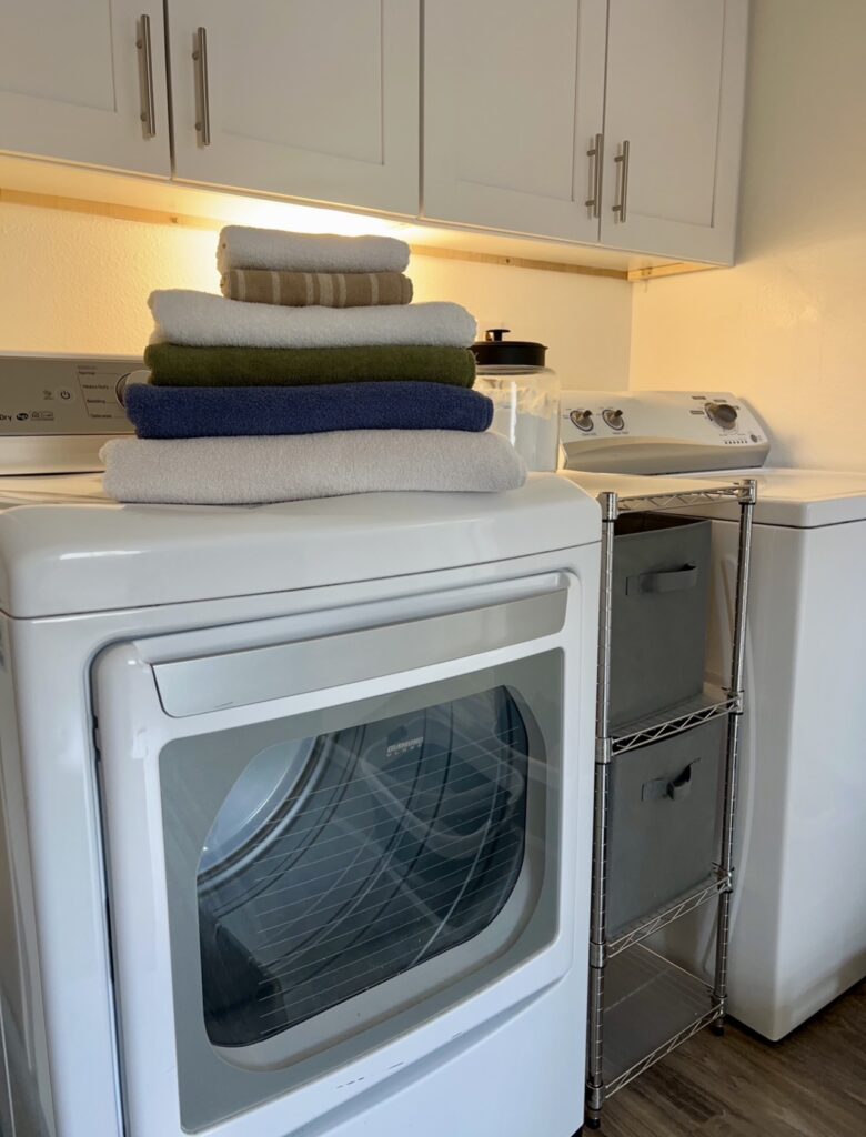 How to stay on top of laundry simple daily laundry routine for busy moms folded mismatch towels on dryer