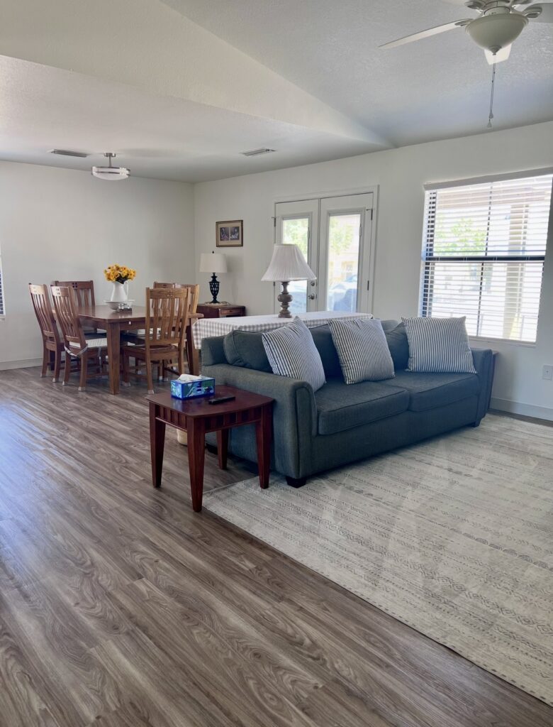 Clean living and dining room after completing spring cleaning